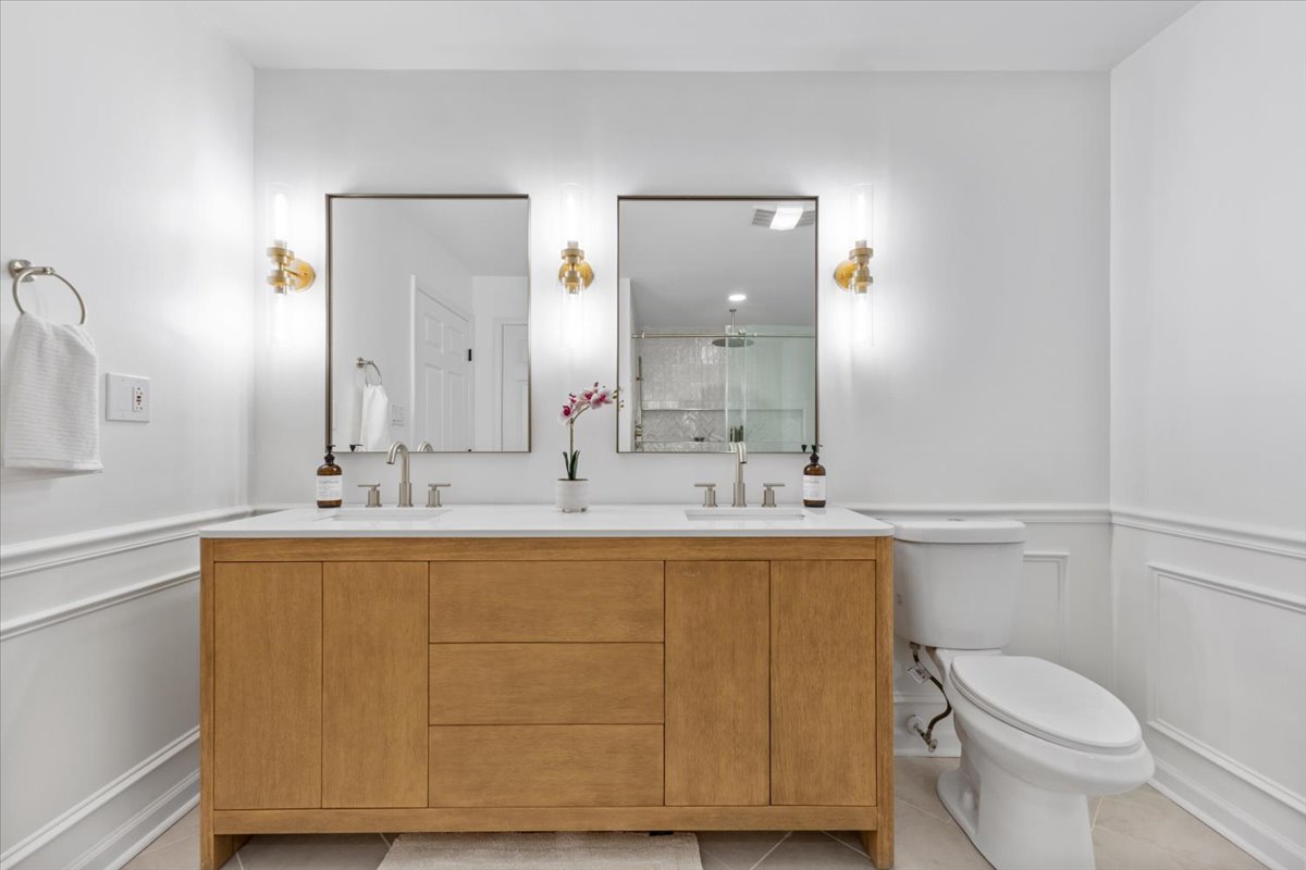 Pepperton: wood double vanity and brass lighting