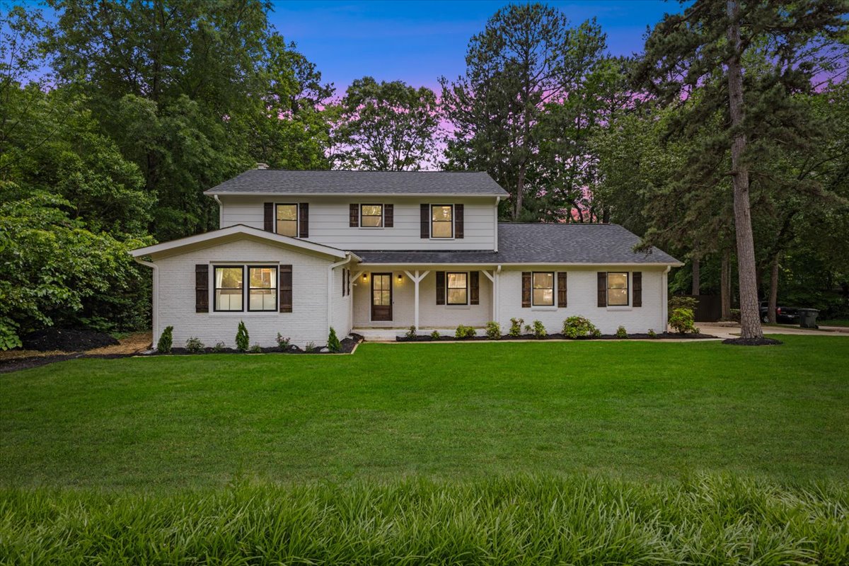 Pepperton: white exterior, front porch, and landscaping